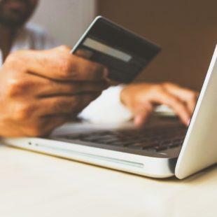 credit card being used on laptop